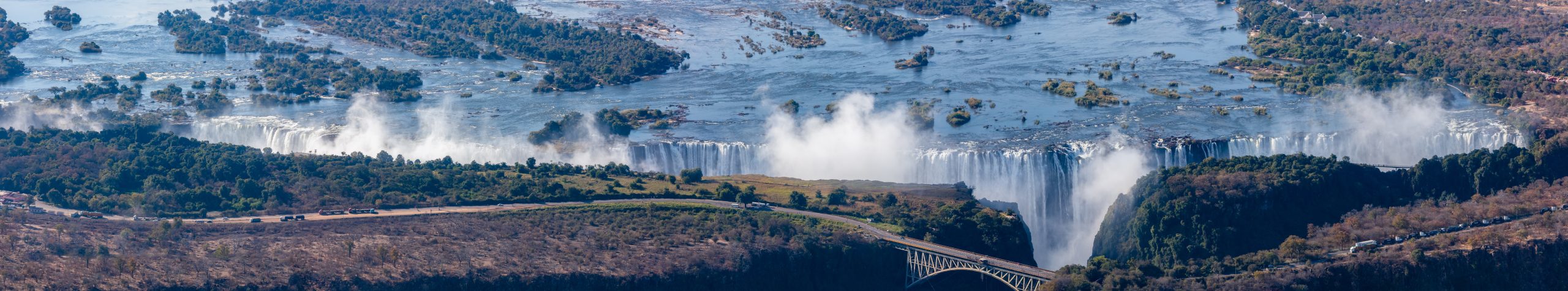 Aerial panorama of Victoria Falls on the Zambia–Zimbabwe border, the largest sheet of falling water in the world