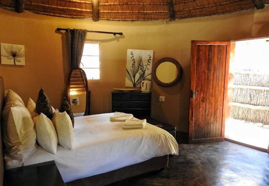 Inside a Riverside Hut at Maliba Mountain Lodge