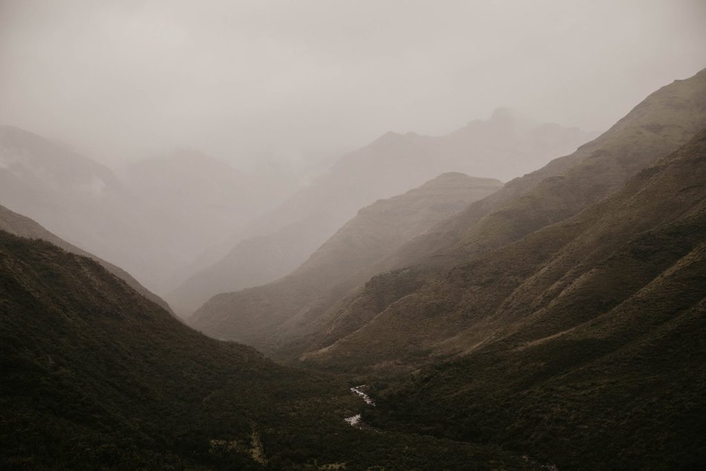 Mist over the mountain valley near the waterfalls and rock pools at Maliba