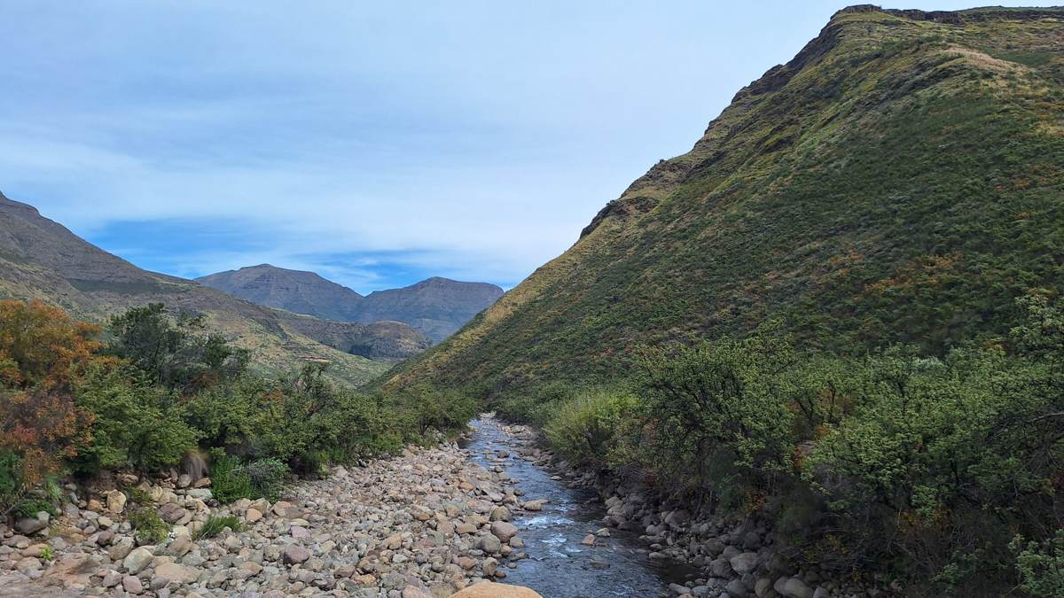 A mountain river running through a green valley near Maliba Mountain Lodge in Ts'ehlanyane National Park